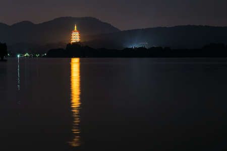 Leifeng Pagoda on the coast of West Lake in Hangzhou, Chinaの写真素材