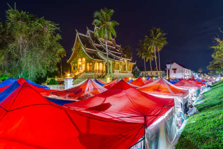 Tents of night market and Royal Palace in Luang Prabang, Laosのeditorial素材