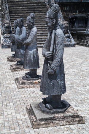 Statues of warriors in Imperial Khai Dinh Tomb in Hue, Vietnam