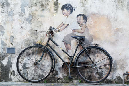 Georgetown, Penang/Malaysia - circa October 2015: Street art and graffiti paintings on the walls of the building in old Georgetown, Penang, Malaysiaのeditorial素材
