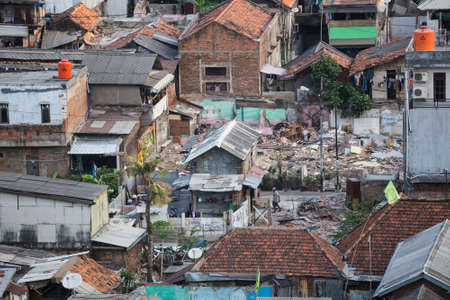 Jakarta, Indonesia - circa October 2015: Slums of Jakarta, capital of Indonesiaのeditorial素材