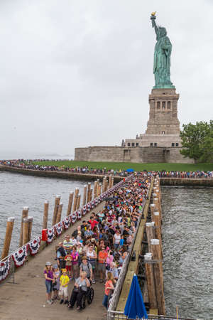 New York City, NY/USA - circa July 2015: People waiting a ferry from Statue of Libery islandのeditorial素材