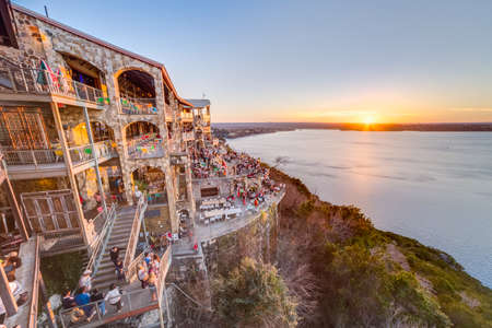 Austin, TX/USA - circa February 2016: Sunset above Lake Travis from The Oasis restaurant in Austin,...