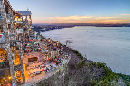 Austin, TX/USA - circa February 2016: Sunset above Lake Travis from The Oasis restaurant in Austin, Texasのeditorial素材