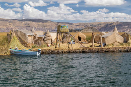 Puno, Peru - circa June 2015: Uros floating island and village on Lake Titicaca near Puno, Peruのeditorial素材