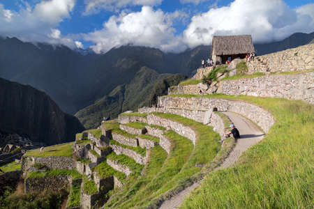 Machu Picchu, Aguas Calientes/Peru - circa June 2015: View of terraces in Machu Picchu sacred lost city of Incas in Peruのeditorial素材