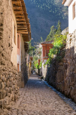 Ollantaytambo, Urubamba/Peru - circa June 2015: Old narrow street and brick buildings in Ollantaytambo Inca townのeditorial素材