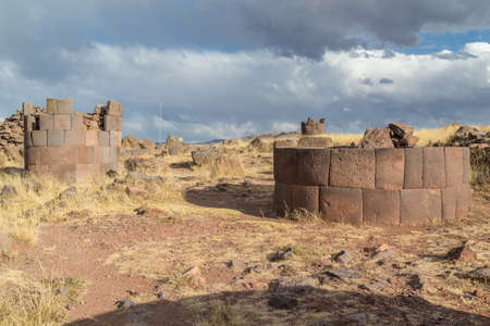 Sillustani Ancient burial ground with giant Chullpas cylindrical funerary towers built by a pre-Incan people near Lake Umayo in Peruの写真素材
