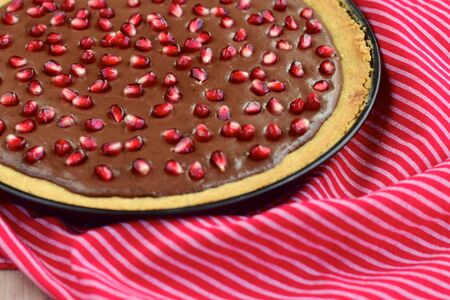 Chocolate tart with pomegranateの写真素材