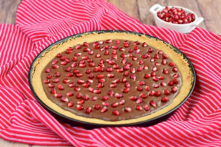 Chocolate tart with pomegranateの写真素材