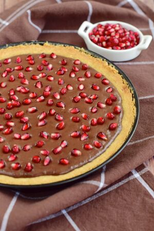 Chocolate tart with pomegranateの写真素材