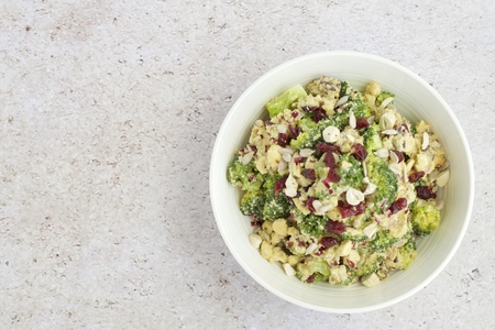 Broccoli salad with cashew nut, sunflower seed and cranberryの写真素材
