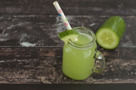Cucumber juice in a jarの写真素材