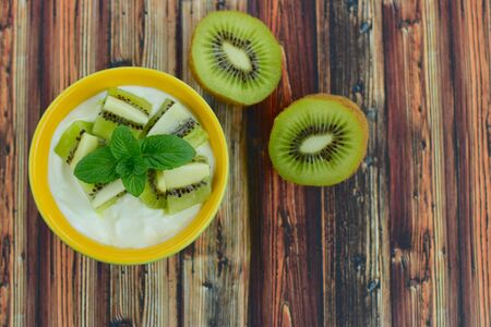 Greek yogurt with kiwiの写真素材