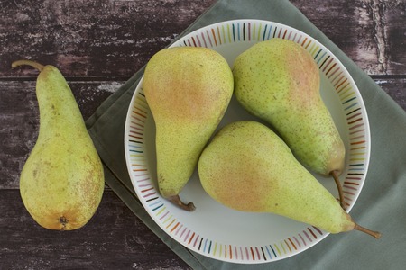 Pears on plate, top viewの写真素材