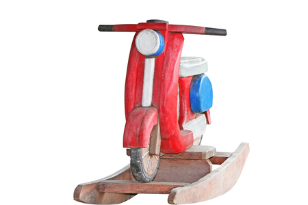 Red motorbike rocking wooden.の写真素材