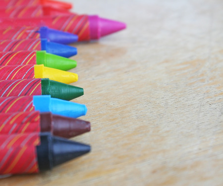 Colorful crayon on woodの写真素材