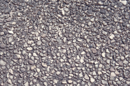 Old small stone on floor background