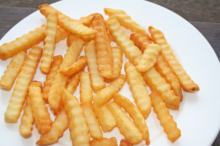 French fries on white plate
