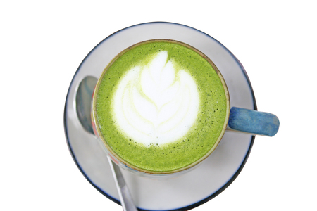 Top view cup of hot green tea isolated on white backgroundの写真素材
