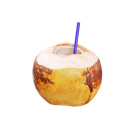 Yellow coconuts with purple drinking straw isolated on white background, clipping path,fresh juiceの写真素材