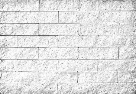 Delicate white sand stone wall texture for backgroundの写真素材