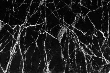 Marble black surface white cracked veins patterns abstract nature backgroundの写真素材