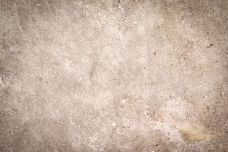Old cement wall background with space and brown brick edge patternsの写真素材