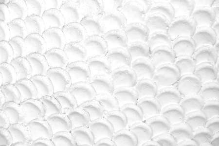 White stucco with art seamless patterns of serpent scale skin in temple abstract backgroundの写真素材