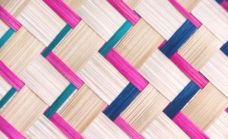 Colorful weaving crafts seamless patterns of bamboo wood wall for brown pink blue on backgroundの写真素材