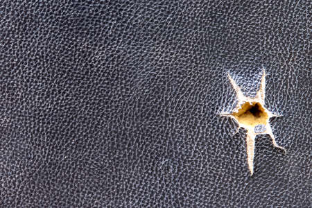 Black leather texture with torn patterns for old background