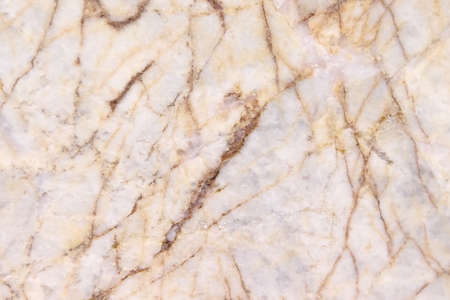 Marble texture with brown yellow vein seamless patterns on backgroundの写真素材
