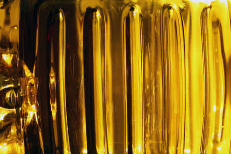 extreme close up of a bottle of apple juice textureの写真素材
