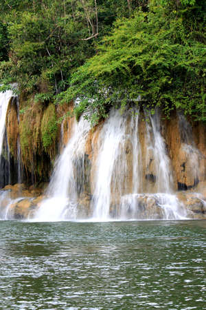 Deep forest waterfall at Erawan waterfall National Park Kanjanaburi Thailandの写真素材