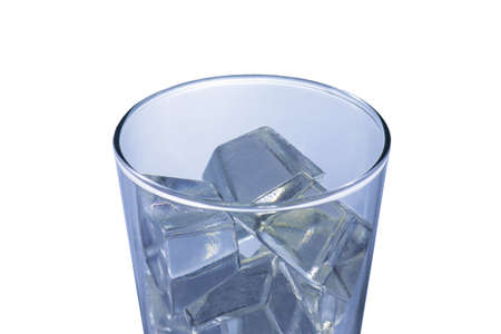 Glass with ice cubes. Isolated on whiteの写真素材