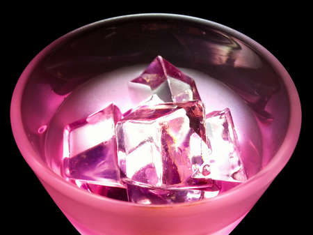 Glass of water and ice on black backgroundの写真素材