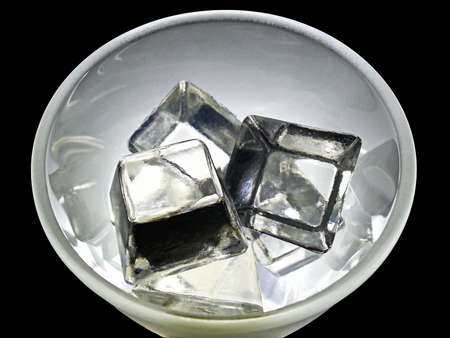 Glass and ice on black backgroundの写真素材