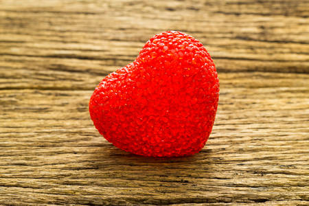 Valentines Day background with Red valentine heart on wood table.の写真素材