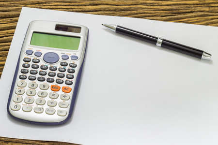 Blank sheet of calculator pens and pencil.の写真素材