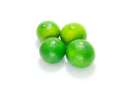 Green lime isolated on white background.の写真素材