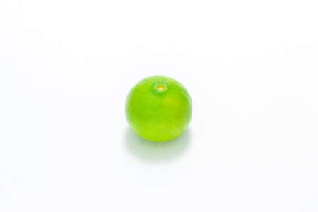 Green lime isolated on white background.の写真素材