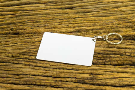 Blank space card plate on wooden background.の写真素材