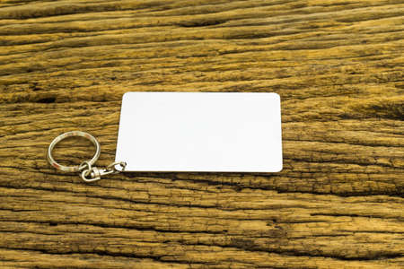 Blank space card plate on wooden background.の写真素材