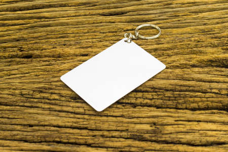 Blank space card plate on wooden background.の写真素材