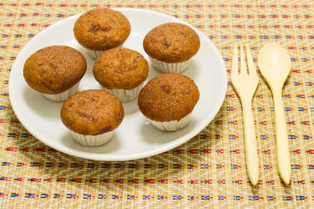 Banana cup cake on bamboo mat.の写真素材