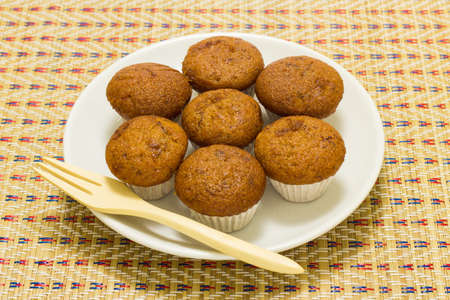 Banana cup cake on bamboo mat.の写真素材
