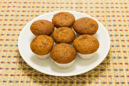Banana cup cake on bamboo mat.の写真素材