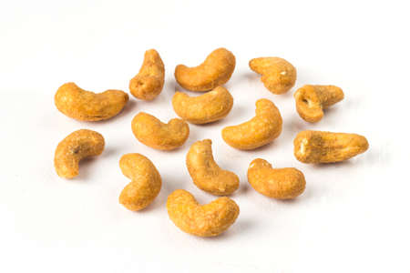 Cashew salted nuts on white background.の写真素材
