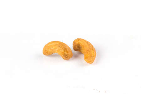 Cashew salted nuts on white background.