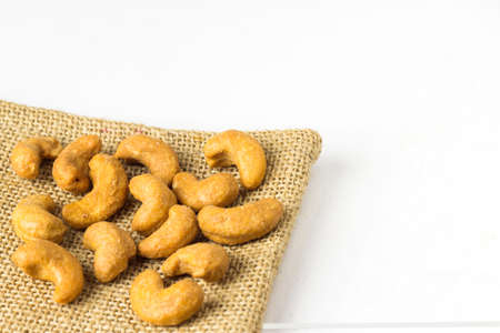 Cashew salted nuts on white background.の写真素材